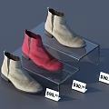 Beige and Red Ankle Boots on Clear Display Shelves with Price Tags