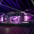 Dynamic Stage Design With Purple Green Lighting LED Screens And Geometric Lines