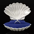 Silver Shell Shaped Display Case With Blue Cushion And Ring Inside 3d model