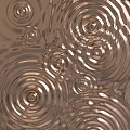 Modern Metallic Wall Decor With Concentric Circle Patterns And Reflective Ripple Effect
