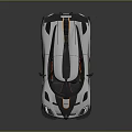 White High Performance Sports Car With Streamlined Body Black Accents And Rear Spoiler