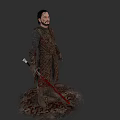 Medieval Game and Movie Character in Detailed Outfit Holding Red Sword on Bloodstained Ground