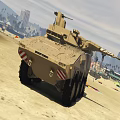 Tan Colored Armored Tank Parked On Beach With Urban Landscape And Palm Trees