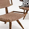 Two Wooden Frame Leisure Chairs With Woven Seats And Black White Patterned Cushions