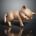 Golden Kitten Sculpture with Closed Eyes Standing on Black Surface and Reflection