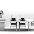 Modern Dark Dining Table Set With Light Wooden Chairs Wine Glasses Plates And Green Plant