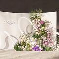 Stylish Floral Decoration Setup With White Curved Backdrop And Mixed Color Flowers Green Plants
