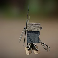 Classic Wooden Windmill Model With Rotating Blades And Sturdy Stone Base