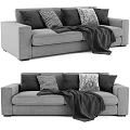 Gray Two Seater Sofa With Patterned Pillows And Cozy Throw Blanket 3d model