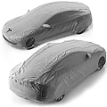 Tesla Car Covered With Protective Full Body Gray Cover Showing Front And Rear Views