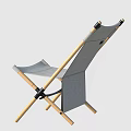 Outdoor Table Setup With Folding Chairs Orange Umbrella And Wooden Crate