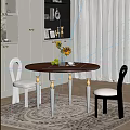 Elegant Round Brown Dining Table And Black Chairs With Golden Leg Accents Sunflowers White Cabinets