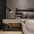 Modern Double Bed With Leather Headboard Bedside Table And Black Desk Lamp