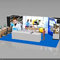 Exhibition Booth Interior With Blue Carpet White Reception Desk And Large Screen Showing People Interacting