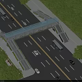 Glass Roof Pedestrian Bridge Over Road With Buses Cars And Trees