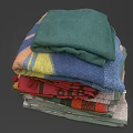 Colorful Towels Stacked With Various Colors And Patterns Essential Daily Living Supplies