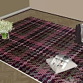Black and Pink Plaid Square Rug with White Flowers and Magazines on Wooden Floor