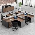 Modern Office Workstations With Wooden Tops Black Frames Computers And Green Plants