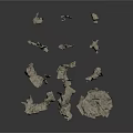 Natural Gray Stone Fragments With Irregular Shapes And Rough Surfaces On White Background