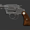 Vintage Revolver Firearm With Polished Metal Parts And Wooden Grip Handle