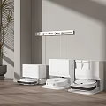 White Household Robot Vacuum Cleaners In Modern Room With Wooden Floor And Plant