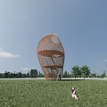 Woven Spiral Observation Deck In Green Meadow With Blue Sky And Trees