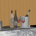 Elegant Wine Bottles And Glasses Arrangement On Marble Countertop With Ice Bucket