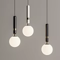 Modern Pendant Lights Design with Black White Rods Round White Shades and Gold Accents