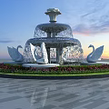 Garden Ornament Feature With Multi Tiered Fountain And Swan Sculptures Surrounding Flower Bed At Sunset