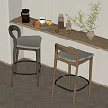 Modern Bar Stools With Padded Seats At Counter With Breakfast Items And Plants