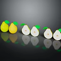 Row of Fresh Pears Including Yellow Whole and White Sliced with Green Leaves and Reflections
