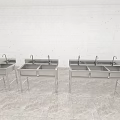 Stainless Steel Vegetable Washing Sinks Three with Faucets on Stands on Marble Floor