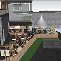 Outdoor Restaurant Seating Area With Trees Umbrella Stone Steps And Greenery