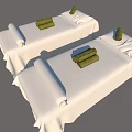 Two Massage Beds With White Sheets Green Rolled Towels And Pillows