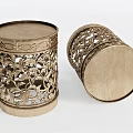 Golden Cylindrical Stools With Intricate Cutout Patterns And Ornate Decorative Edges
