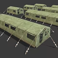 Multiple Green Military Tents In Canvas Material With Ropes And Frames