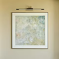 Abstract Painting in Black Frame Hanging on Beige Wall with Spotlight Light Blue Yellow Tones