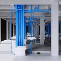 Blue Pipes in Industrial Interior with White Toilets and Sanitary Fixtures