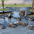 Garden Ornaments With Water Feature Natural Stones And Trees On Circular Platforms