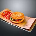 Burger King Hamburger With Sesame Seed Bun Fresh Lettuce And Tomato On Wrapper