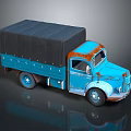 Blue Rusty Vintage Truck With Black Canvas Covered Cargo Bed