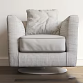 Modern Gray Accent Chair With Brown Pillow And Metal Base For Living Room Interior