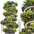 Elegant Modern Spiral Column Decorated With Lush Green Plants And Circular Lighting