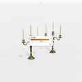 Elegant Brass Candelabra Pair With Three Candles Each And Ornate Bases