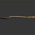 Golden Decorative Spoon With Intricate Handle Design For Home Living