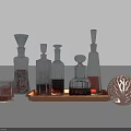 Elegant Wine Bottles and Glass on Wooden Tray with Decorative Tree Ornament