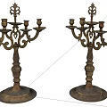 Vintage Ornate Metal Candelabra With Decorative Carvings And Multiple Candle Holders