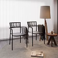 Accent Chairs With Black Frames Gray Cushions And Blankets In Modern Interior With Floor Lamp