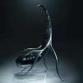 Unique Futuristic Single Chair With Black Seat And Metallic Silver Curved Frame