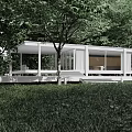 Modern White Single-family House With Large Glass Windows and Lush Green Trees